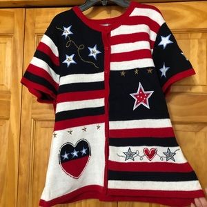 Knit and Pearl knitted red white and blue top with stars and other details